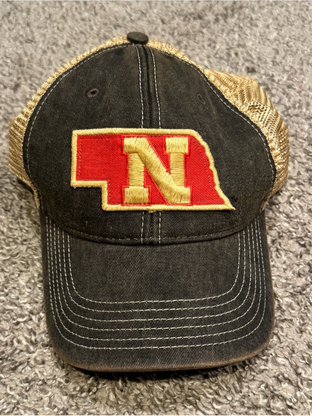 Nebraska Cornhuskers Womenโs Black and Gold Trucker Hat with Red 'N' Patch